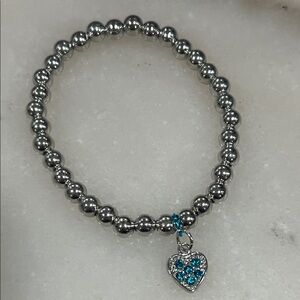 Silver Tone Beaded Stretch Bracelet with Blue Rhinestone Heart Charm